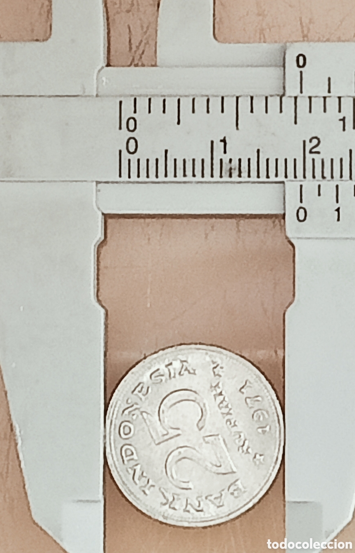 Monedas con errores: Moneda Indonesia (1971) error de ceca - Foto 25