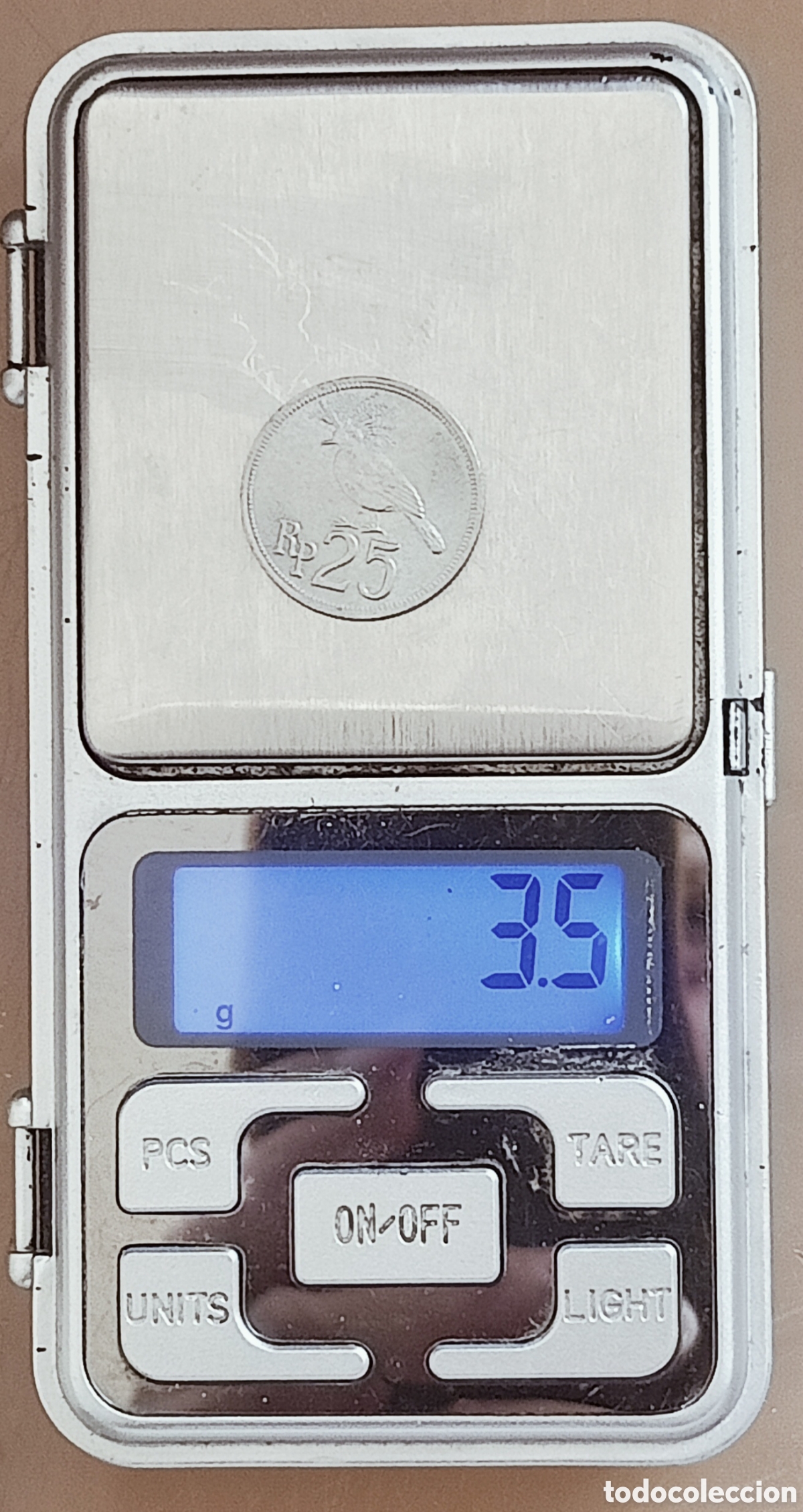 Monedas con errores: Moneda Indonesia (1971) error de ceca - Foto 30