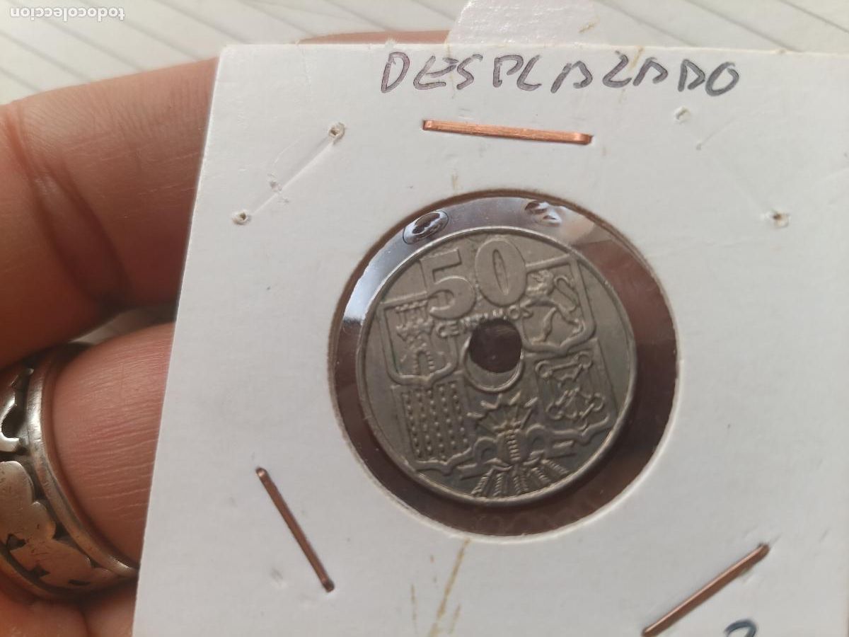 Moedas com erros: 50 c&eacute;ntimos de 1963 estrella 64. Desplazamiento. Agujero desplazado