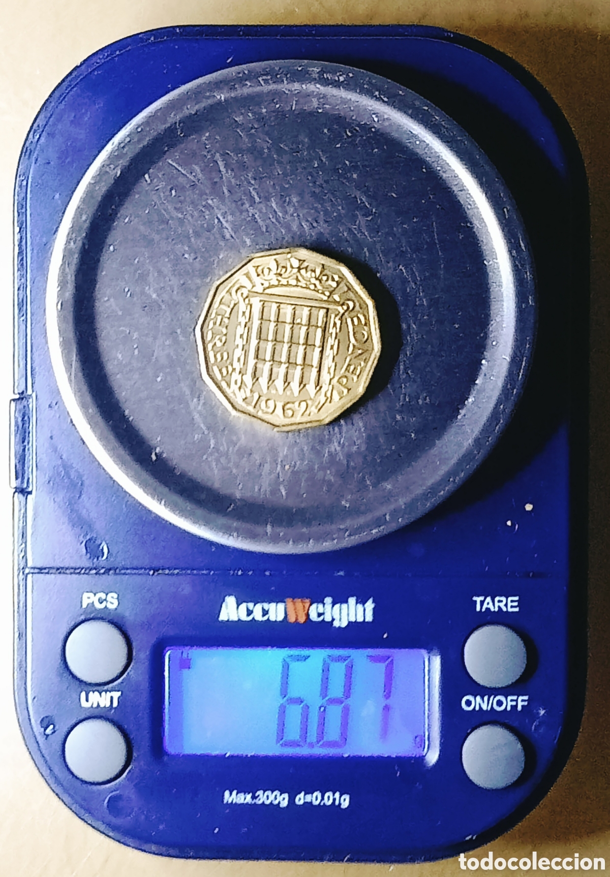 Monedas con errores: Moneda Rei.Unido (1962) error de acu&ntilde;aci&oacute;n - Foto 13
