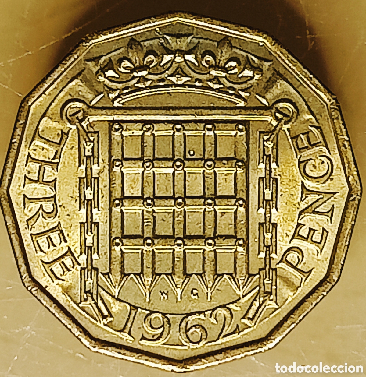 Monedas con errores: Moneda Rei.Unido (1962) error de acu&ntilde;aci&oacute;n