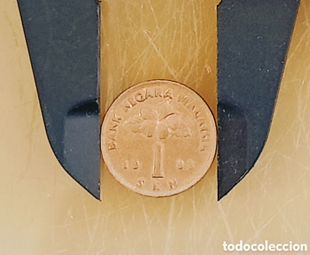 Monedas con errores: Moneda Malasia (1998) error - Foto 14