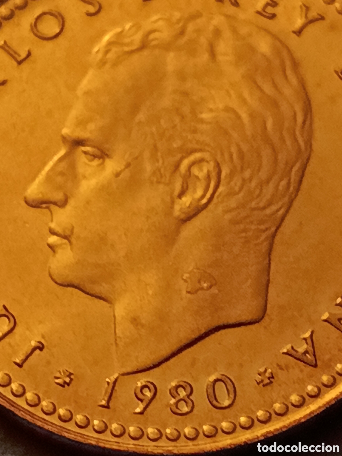 Moedas com erros: ERROR EXCESO DE METAL EN LA CARA - 1 PESETA 1980 *80 - JUAN CARLOS I