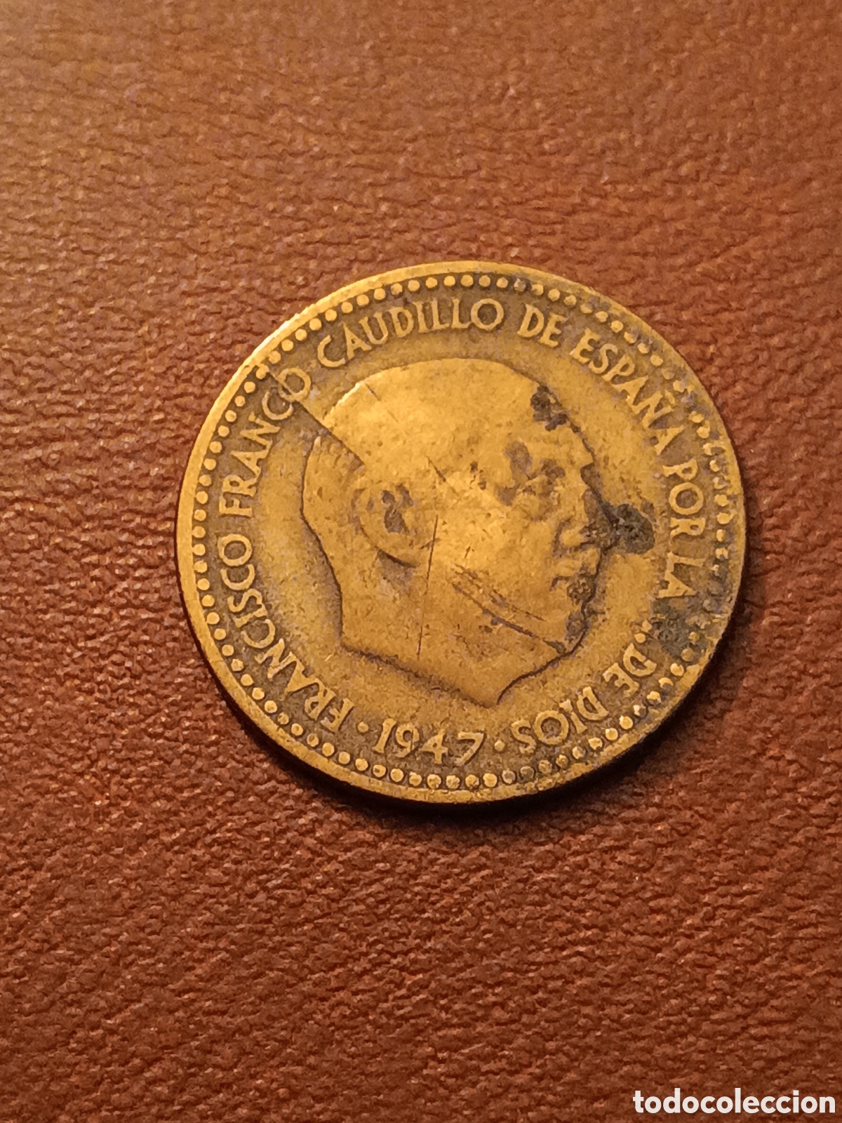 M&uuml;nzen mit Fehlern: ERROR ROTURA DE CU&Ntilde;O - 1 PESETA 1947 - ESTADO ESPA&Ntilde;OL