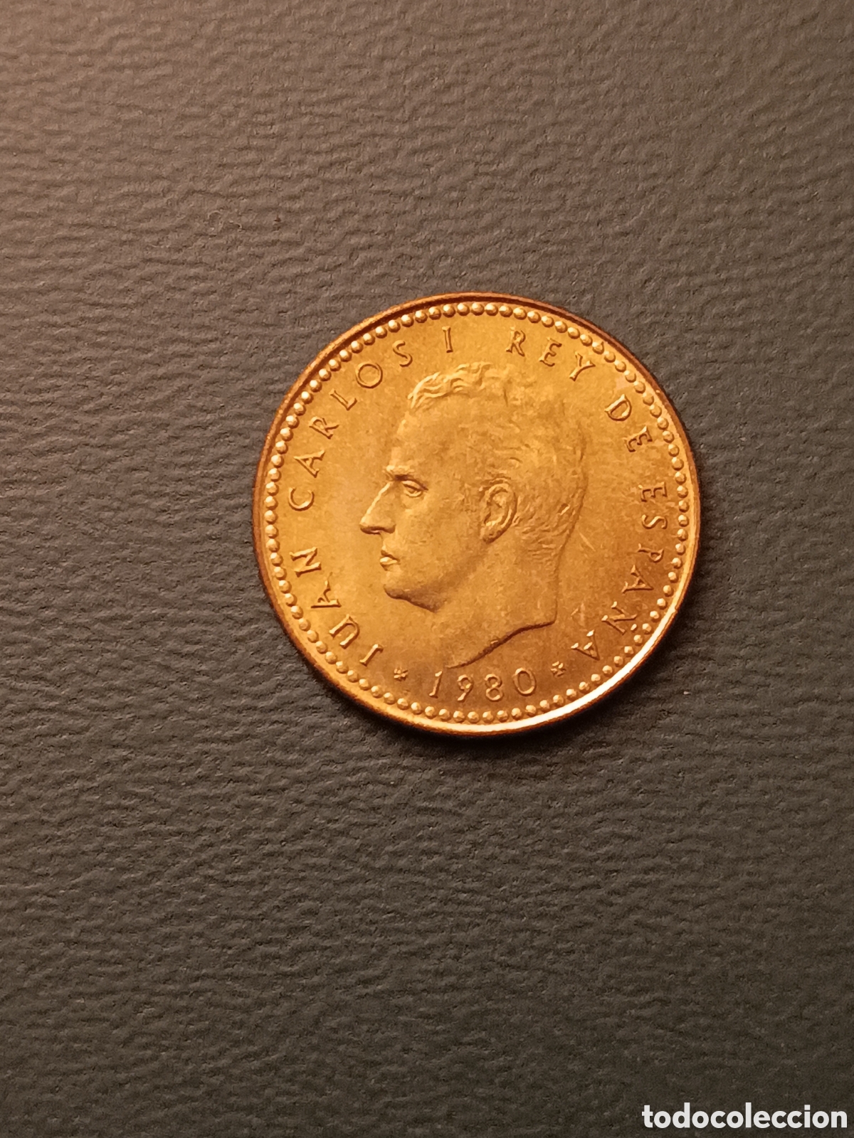Monete con errori: ERROR FALTA PELO - 1 PESETA 1982 *82 - JUAN CARLOS I