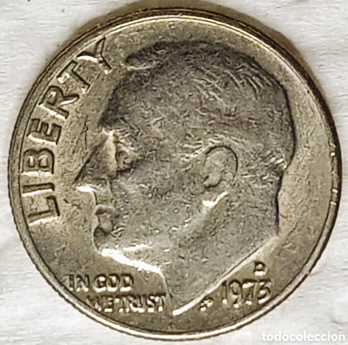 Monedas con errores: Moneda USA (1973*D) error mec&aacute;nico