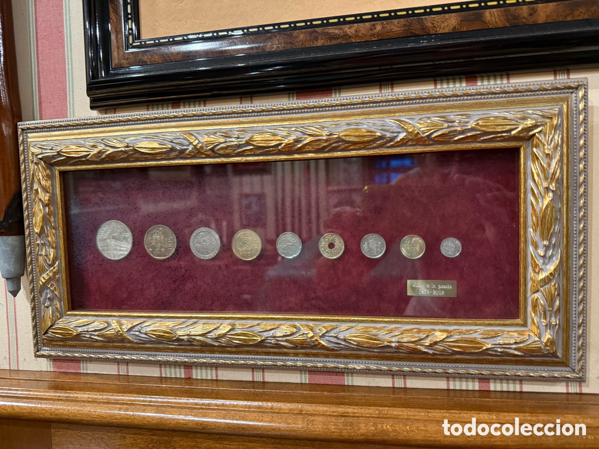 Monedas de Espa&ntilde;a: &ldquo;Adi&oacute;s a la Peseta 1869-2002&rdquo; &ndash; Cuadro con 9 monedas espa&ntilde;olas enmarcadas.