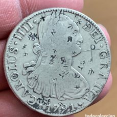 Monedas de España: 8 REALES. CARLOS IIII. 1791 MEXICO. RESELLOS CHINOS. FECHA DIFÍCIL. BUENA CONSERVACIÓN