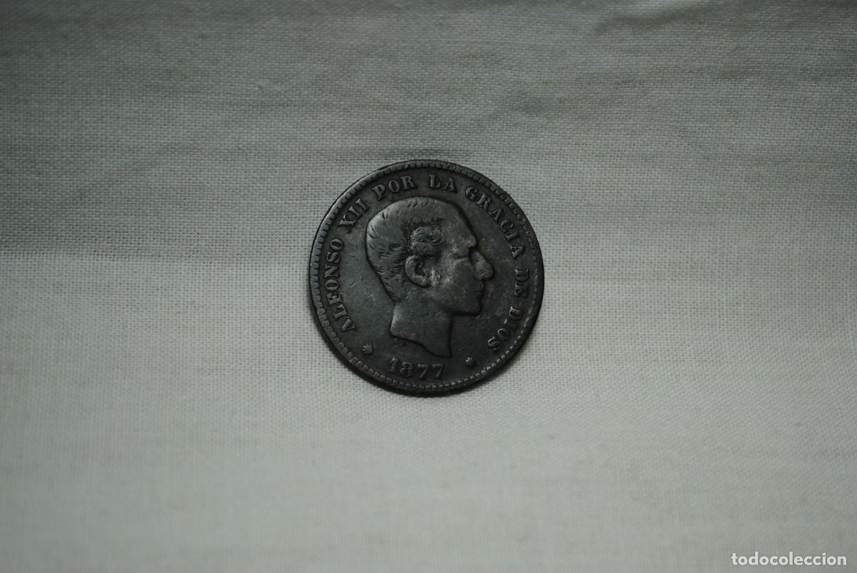 Monedas de Espa&ntilde;a: CINCO CENTIMOS 1877 , ALFONSO XII . - Foto 1