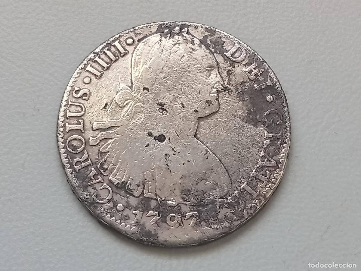 Monedas de Espa&ntilde;a: CARLOS IV 8 REALES PLATA 1797 M&Eacute;XICO FM. RESELLOS CHINOS. PROCEDENTE DE NAUFRAGIO. MBC-