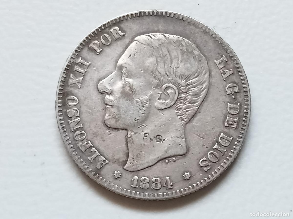Monedas de Espa&ntilde;a: ALFONSO XII 2 PESETAS PLATA 1884 *(18-84) MSM CONTRAMARCA FG MBC-