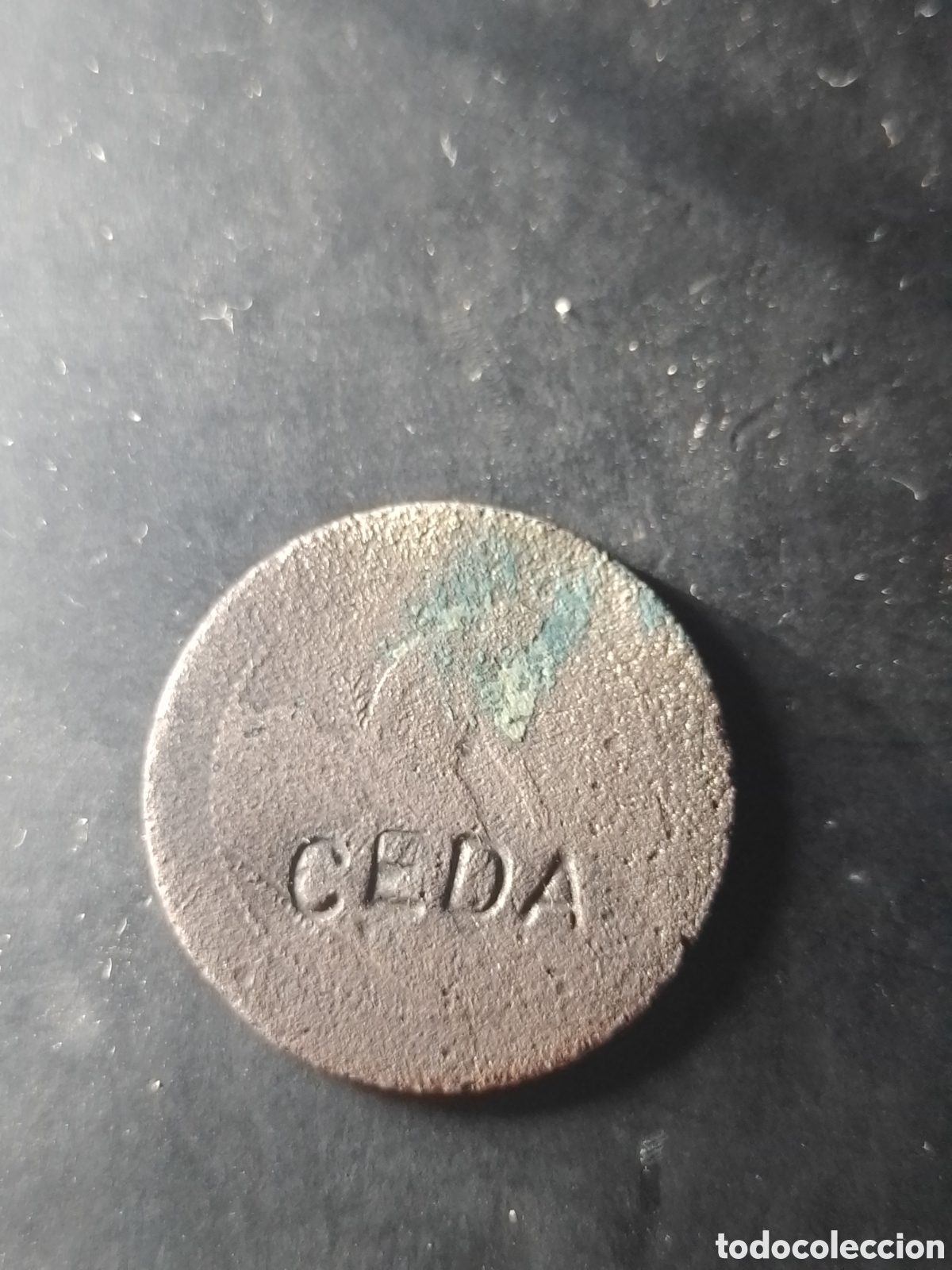 Monedas de Espa&ntilde;a: Antigua moneda resellada.