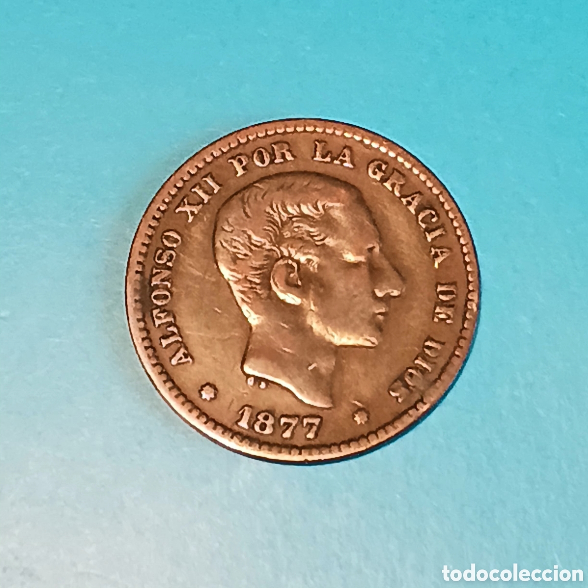 Monedas de Espa&ntilde;a: ALFONSO XII 5 CENTIMOS CU 1877 BARCELONA OM MBC