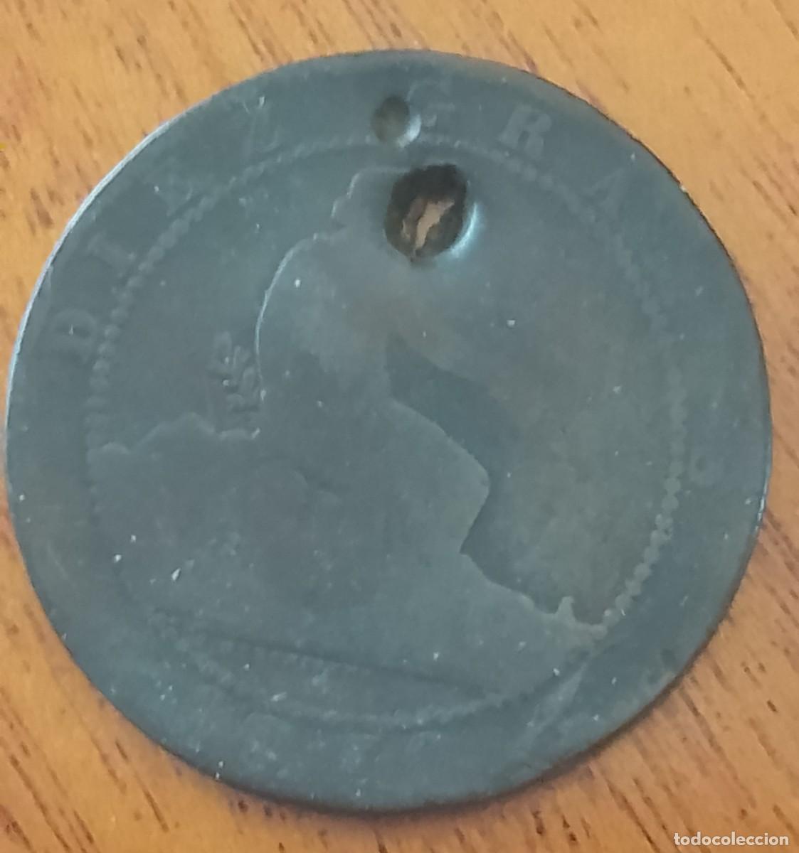 Monedas de Espa&ntilde;a: 10 c&eacute;ntimos 1870. Con agujero de metralla (posiblemente)