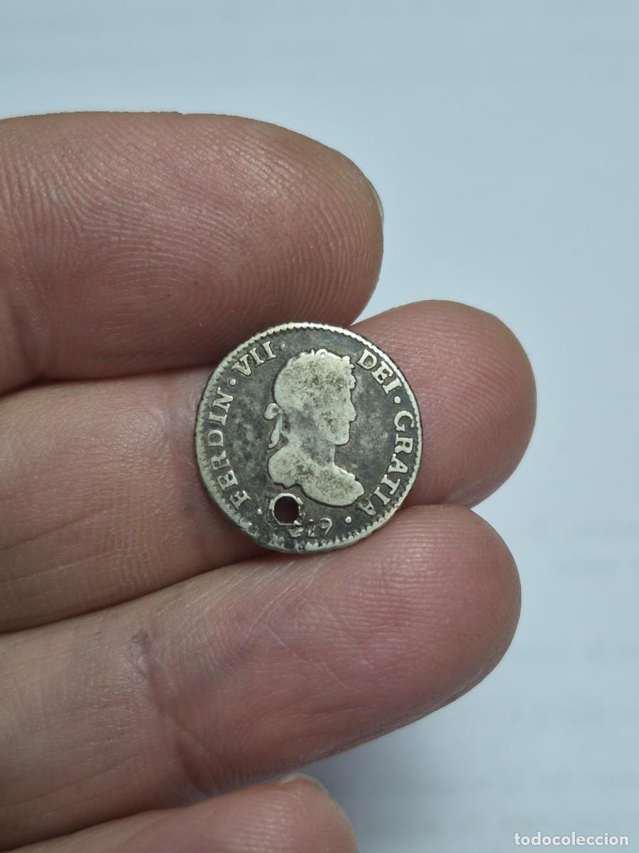 Monedas de Espa&ntilde;a: NT/ FERNANDO VII 1/2 REAL DE PLATA 1819 POTOSI AGUJERO (E940)