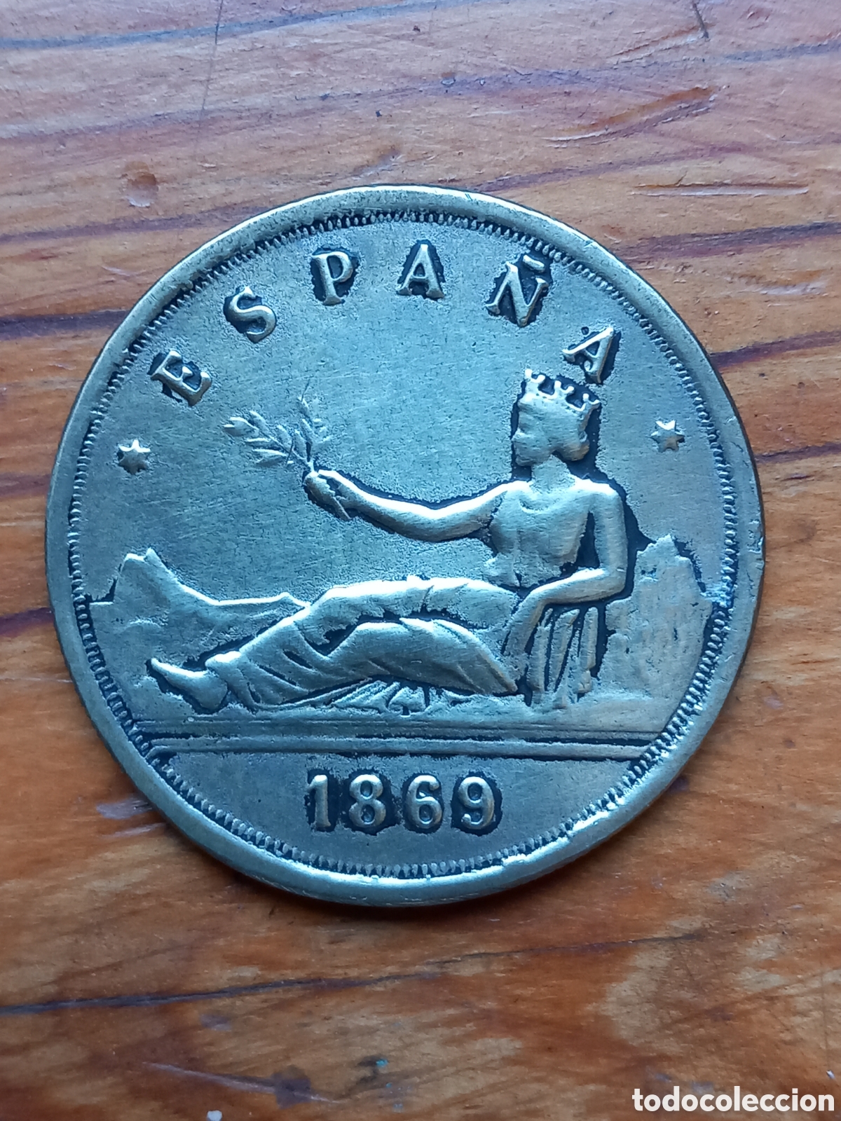 Monedas de Espa&ntilde;a: Moneda plata. Figura reclinada que sostiene una rama de olivo