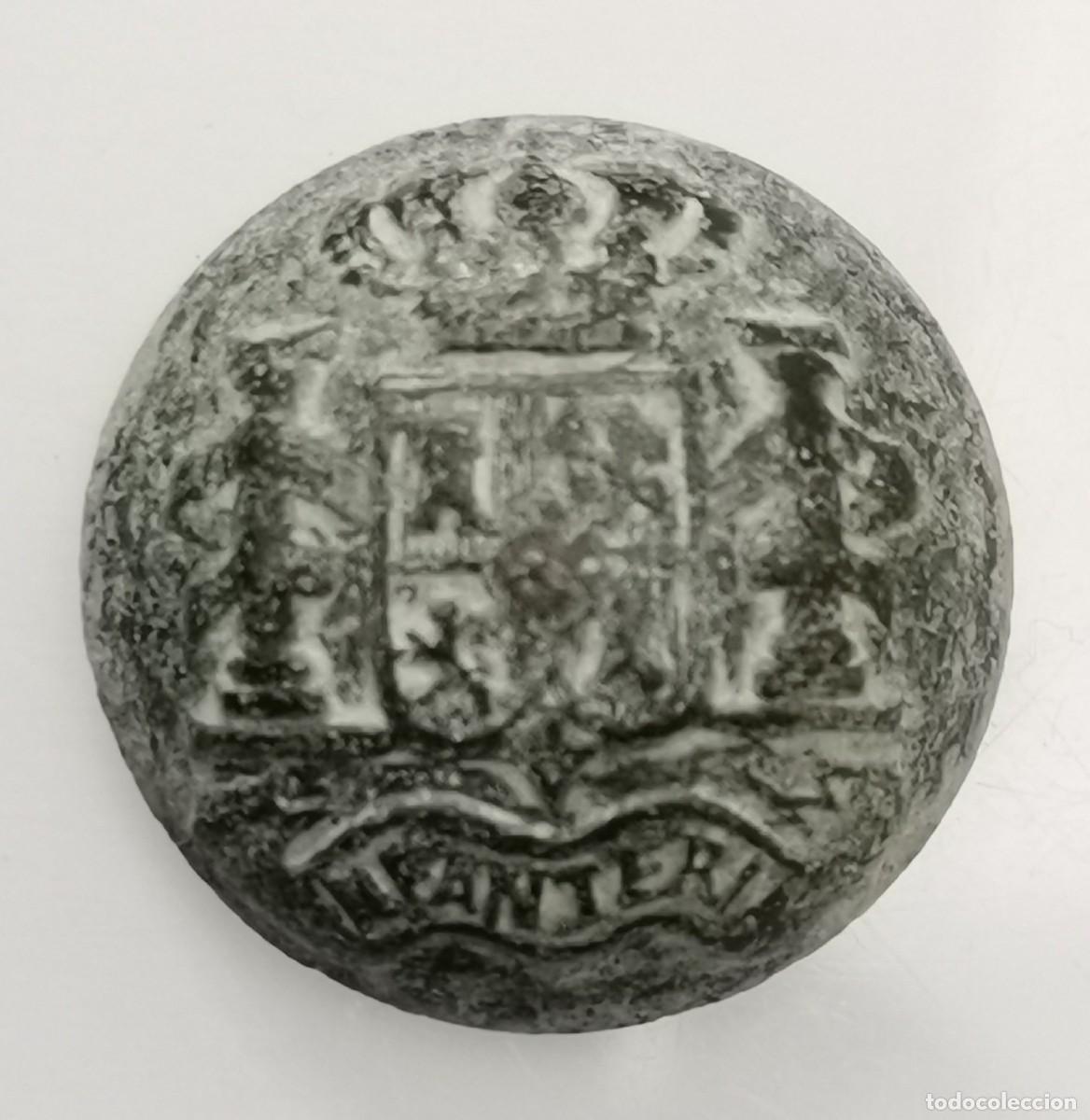 Monedas de Espa&ntilde;a: Bot&oacute;n - Escudo Espa&ntilde;ol - INFANTER&Iacute;A - (1875) Alfonso XII