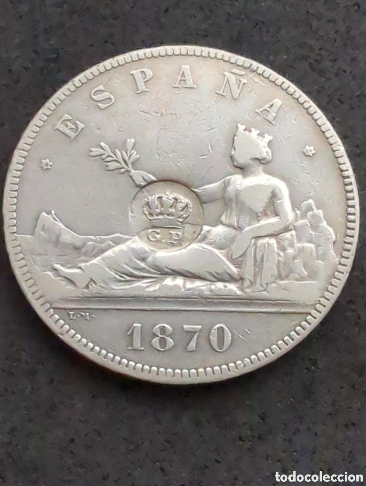 Monete da Spagna: 5 pesetas 1870 con resello plata