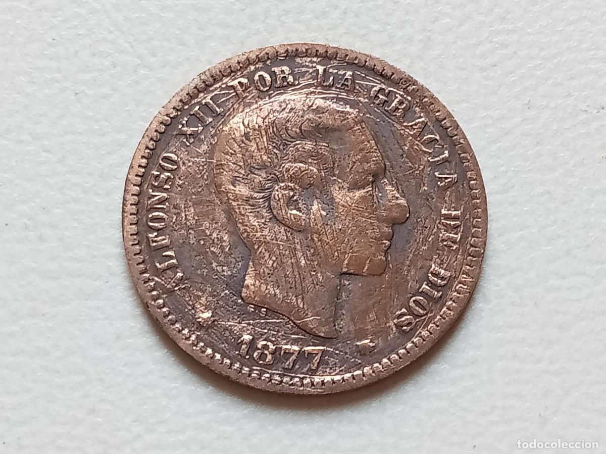 Monedas de Espa&ntilde;a: ALFONSO XII 5 C&Eacute;NTIMOS 1877 OM RAYAS MBC-