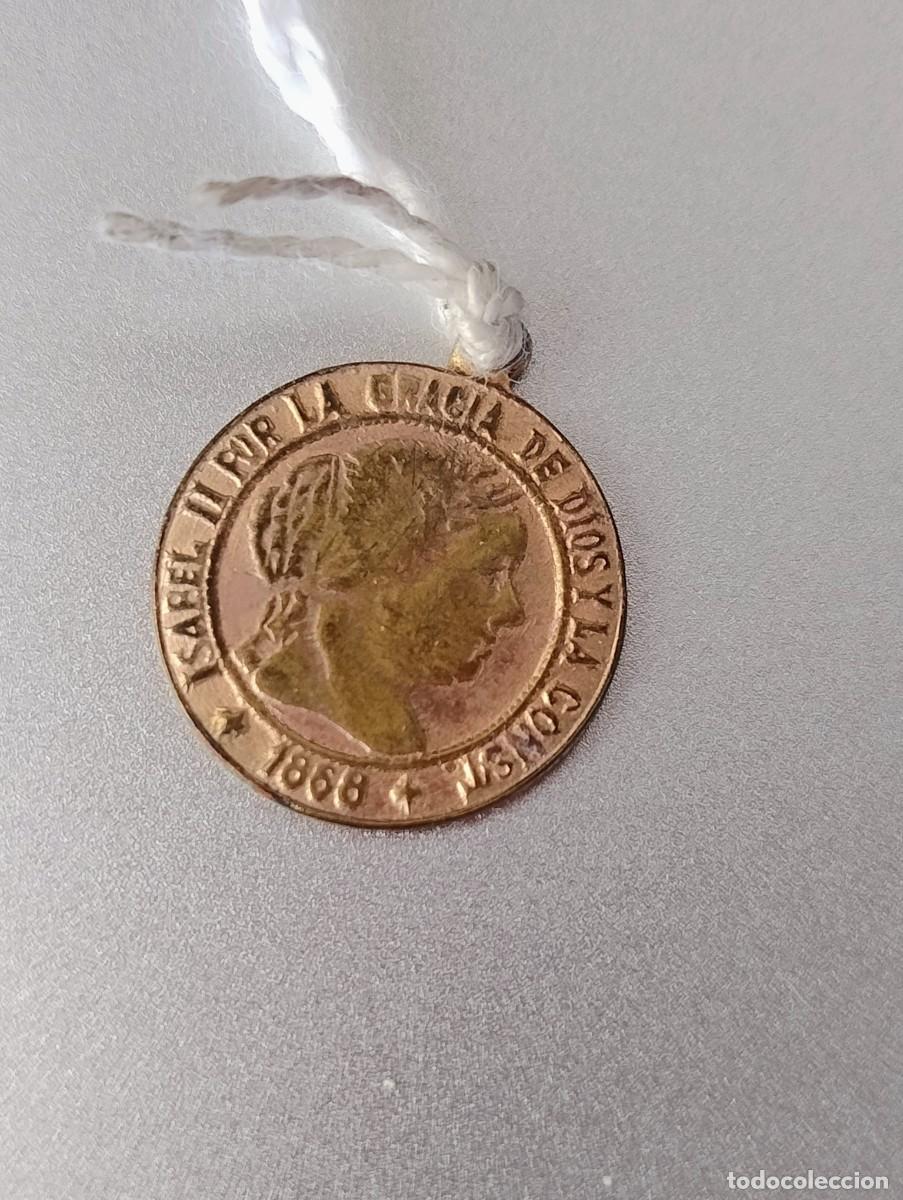 Monedas de Espa&ntilde;a: Medalla de la Reina Isabel II por la Gracia de Dios y la Corono 1868 unos 1,50 cm di&aacute;metro
