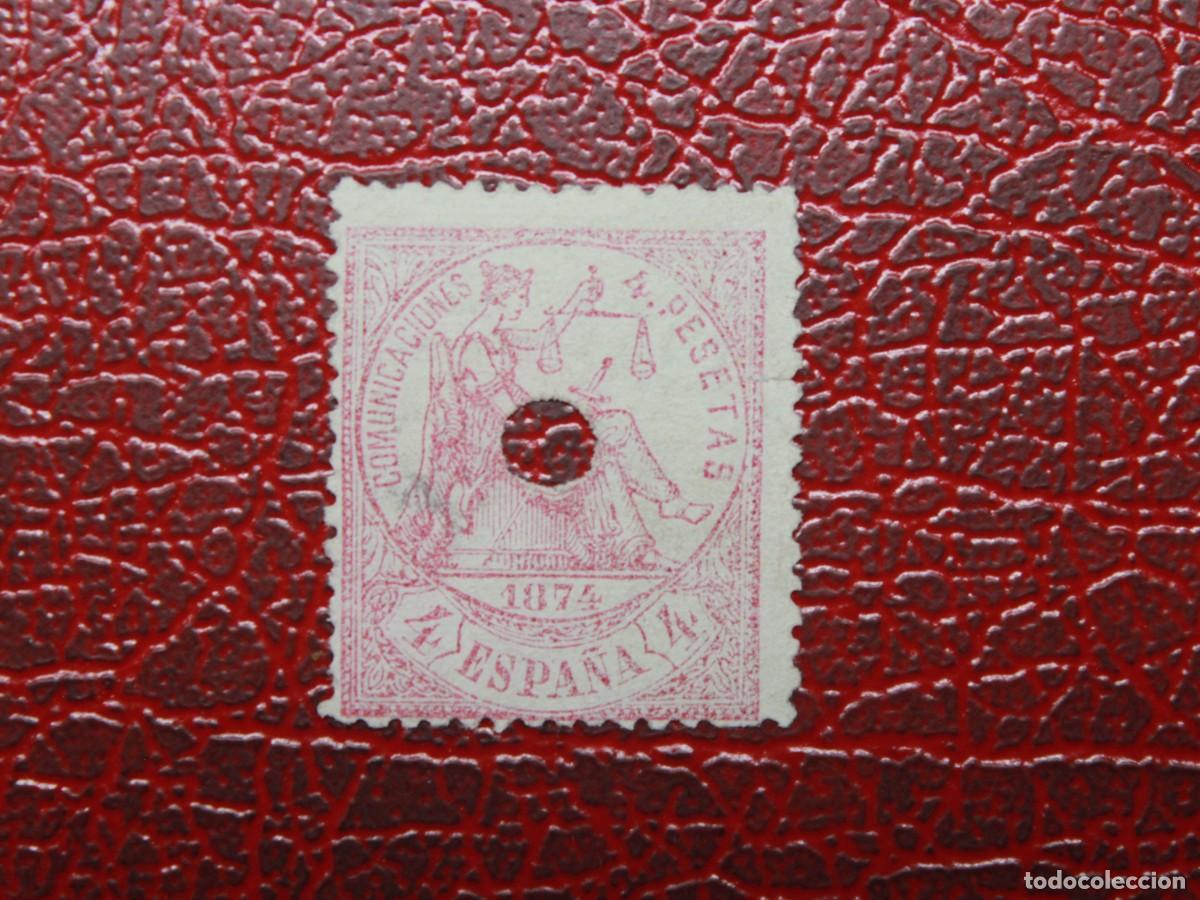Monedas de Espa&ntilde;a: Espa&ntilde;a 1874 - Comunicaciones Secretas - 1 peseta rosa - Sello telegr&aacute;fico perforado