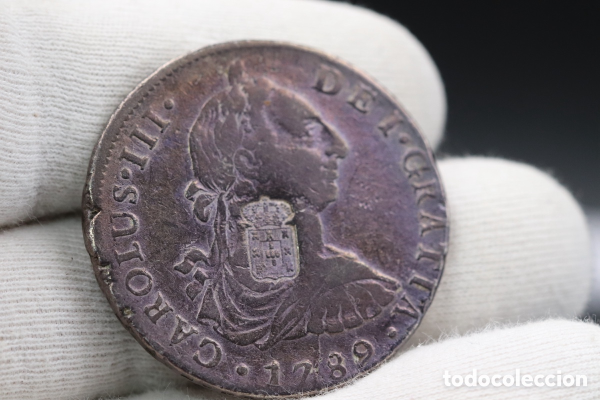 Monedas de Espa&ntilde;a: Carlos IV, busto de Carlos III y contramarca de Mar&iacute;a II de Portugal