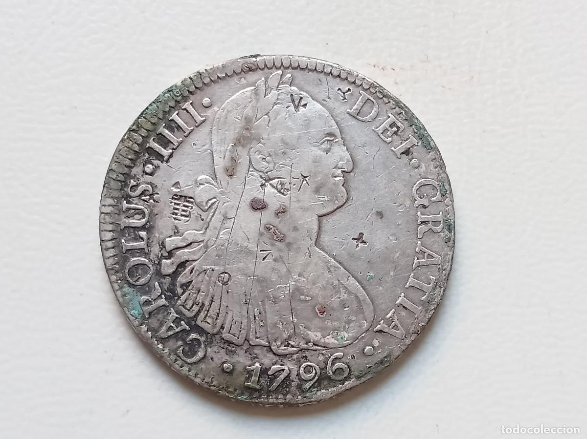 Monedas de Espa&ntilde;a: CARLOS IV 8 REALES PLATA 1796 M&Eacute;XICO FM. RESELLOS CHINOS. PROCEDENTE DE NAUFRAGIO. MBC-