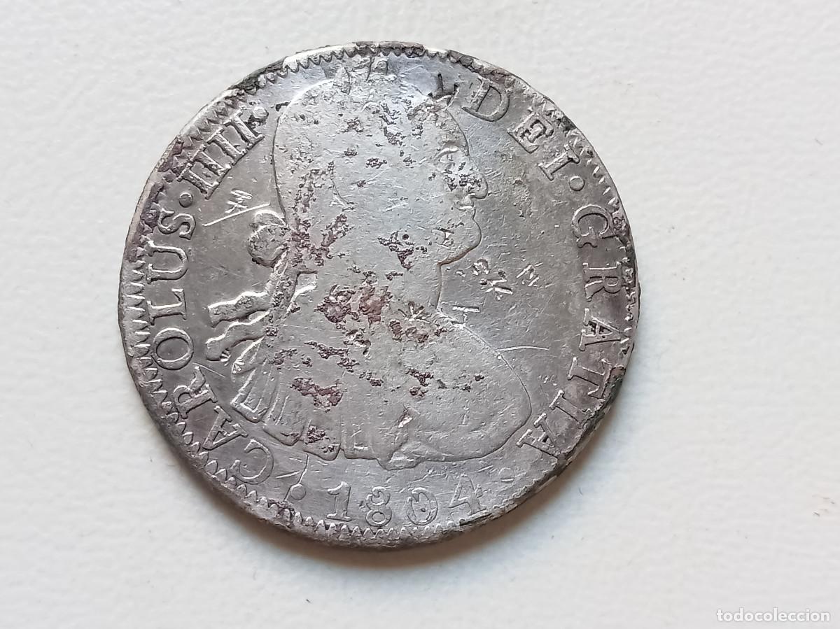 Monedas de Espa&ntilde;a: CARLOS IV 8 REALES PLATA 1804 M&Eacute;XICO TH. RESELLOS CHINOS. PROCEDENTE DE NAUFRAGIO. BC+