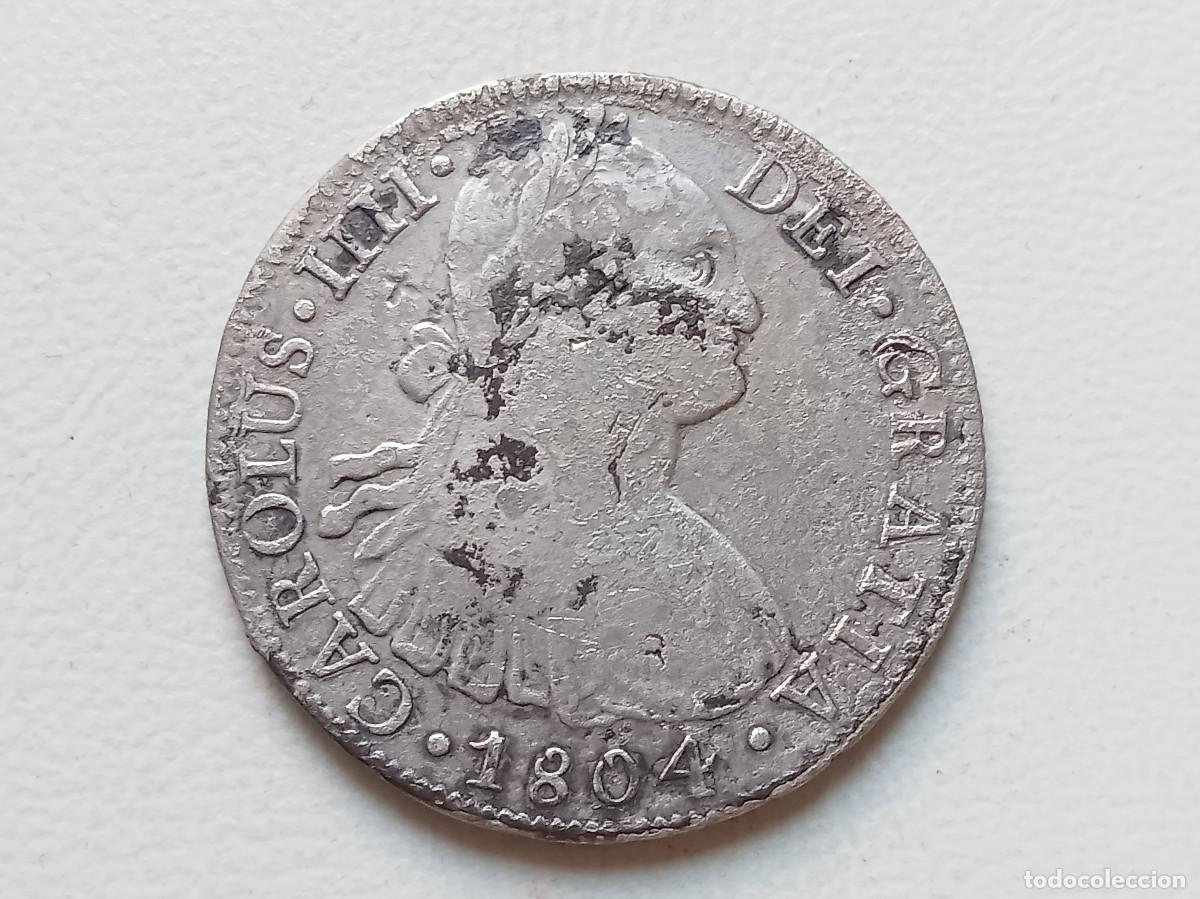 Monedas de Espa&ntilde;a: CARLOS IV 8 REALES PLATA 1804 M&Eacute;XICO TH. RESELLOS CHINOS. PROCEDENTE DE NAUFRAGIO. BC+