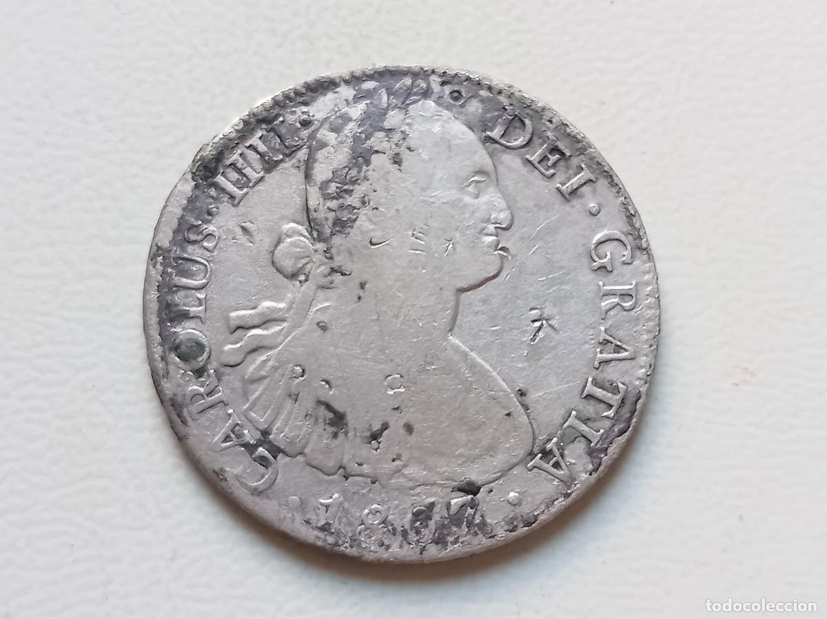Monedas de Espa&ntilde;a: CARLOS IV 8 REALES PLATA 1807 M&Eacute;XICO TH. RESELLOS CHINOS. PROCEDENTE DE NAUFRAGIO.MBC-
