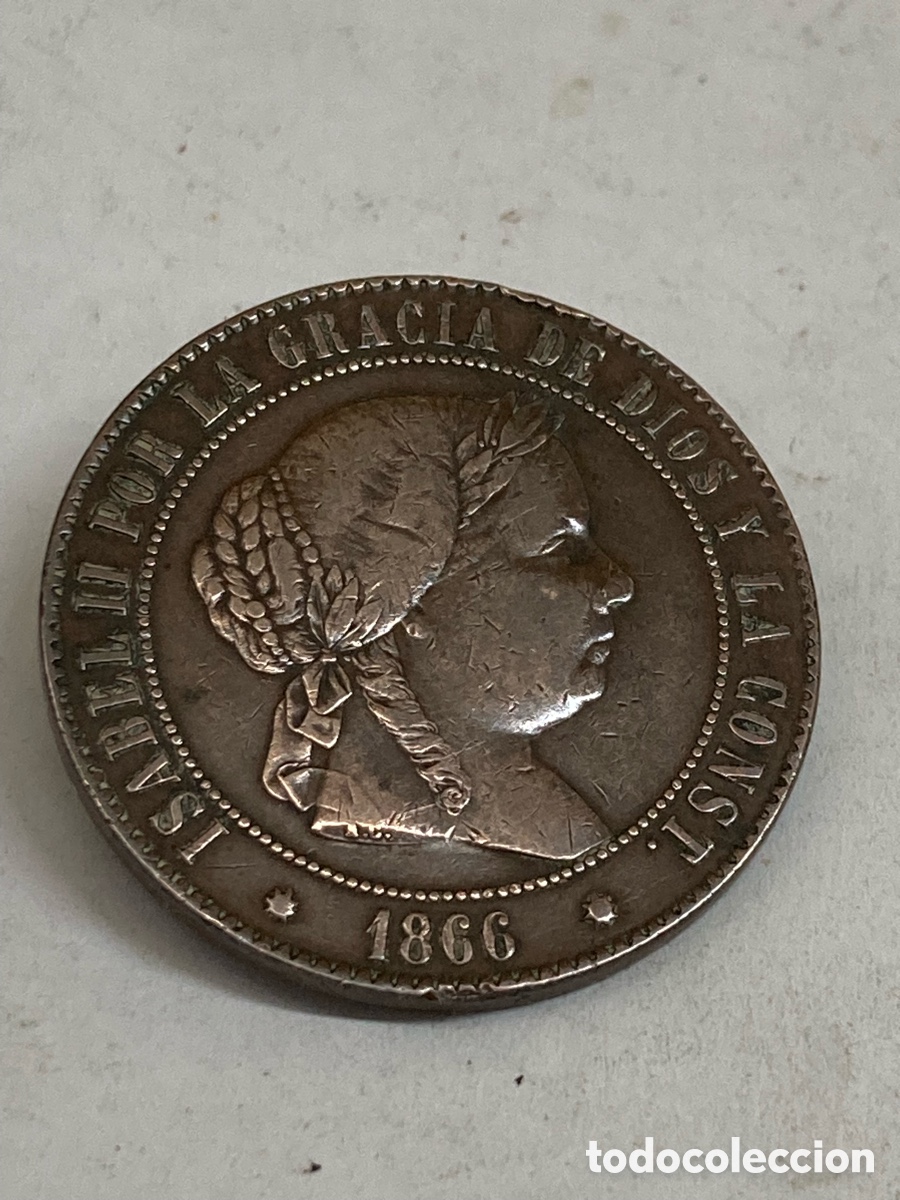 Monedas de Espa&ntilde;a: moneda espa&ntilde;ola de 5 c&eacute;ntimos de escudo de 1866 con la efigie de la reina Isabel II