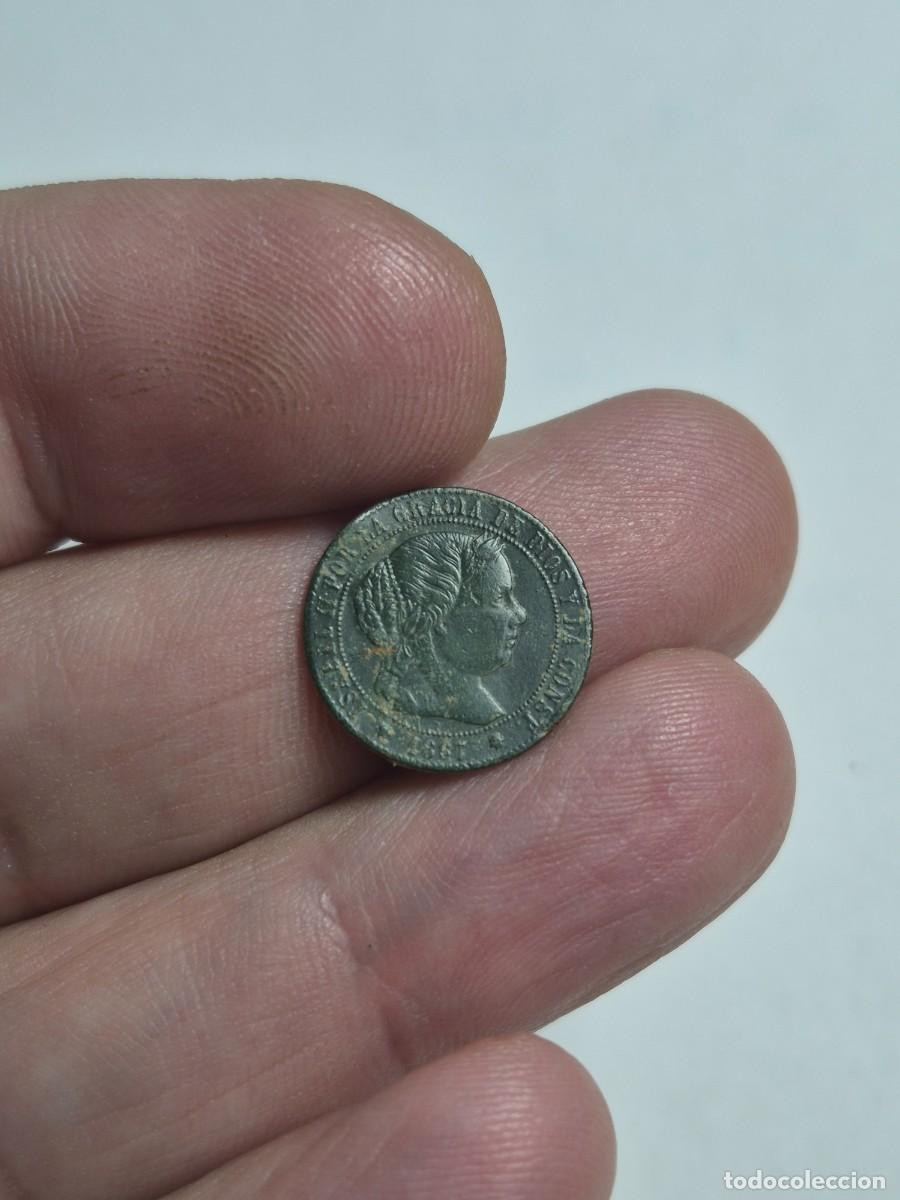 Monnaies d'Espagne: NT/ ISABEL II 1/2 CENTIMOS ESCUDO 1867 SEVILLA GOLPECITO (E1554)