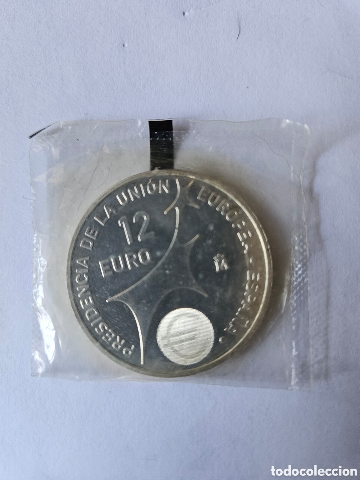 Euros: Dos de monedas 12 &euro; una con precinto