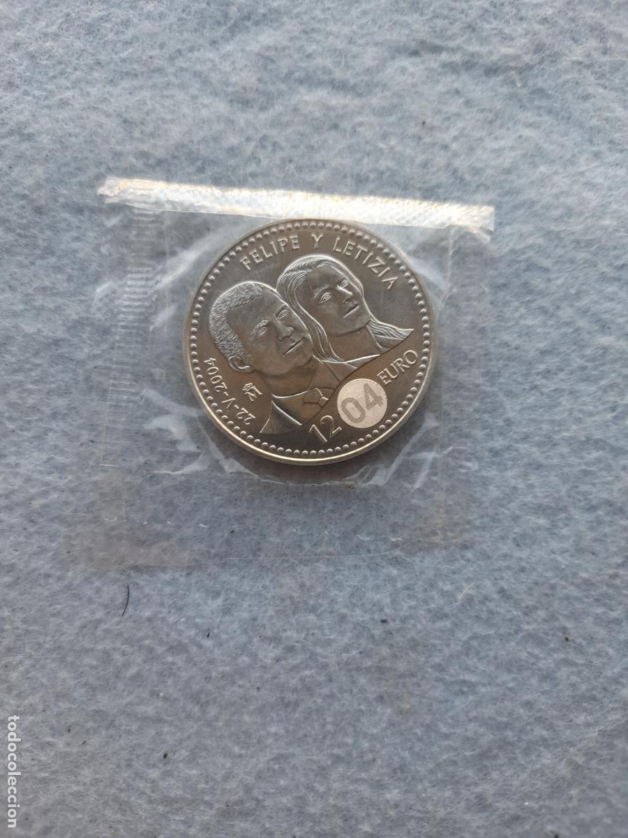 Monete FNMT: Juan Carlos I. 12 Euros. Enlace Felipe y Leticia. A&ntilde;o 2004. Plata.