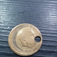 Monedas Franco: ERROR. 1 PESETA 1963 *65. DESPLAZADA Y AGUJEREADA. VER FOTOS. (L9)