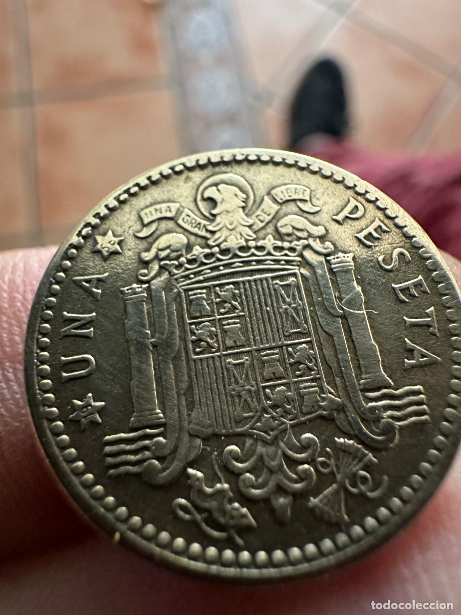 Moedas Franco: Una peseta de 1953 estrellas 19/50