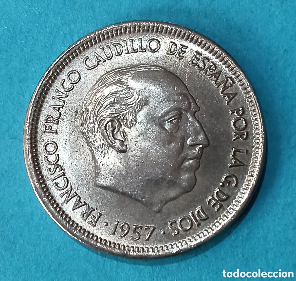 Monedas Franco: 25 Pesetas 1957 *69 S/C con error ( Desplazada y error en Oreja Cortada ). M&aacute;s monedas en mi perfil.