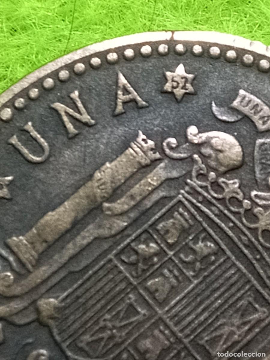Monedas Franco: Una peseta de 1947 estrella 52