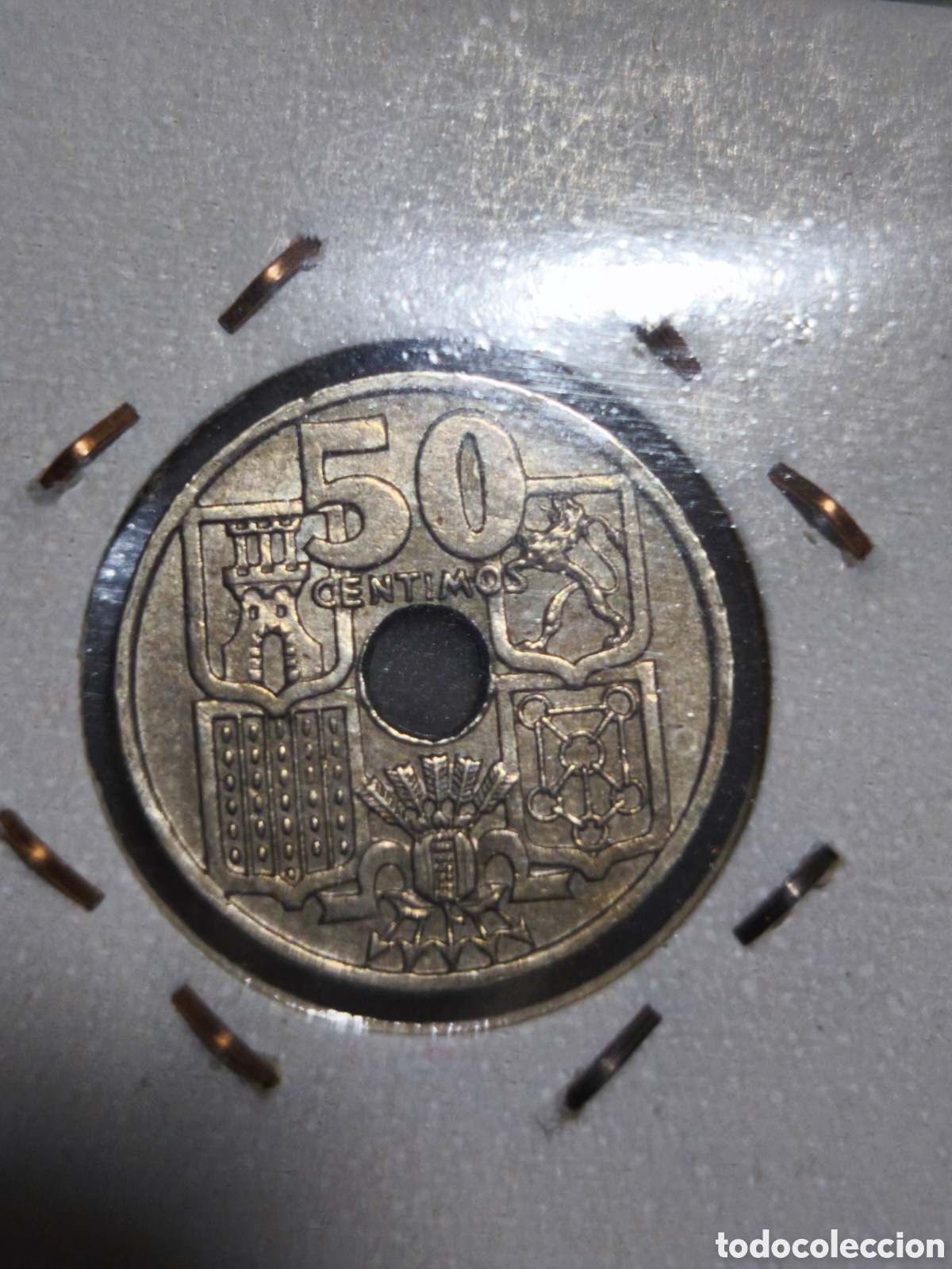 Franco Coins: 50 cts flechas invertidas