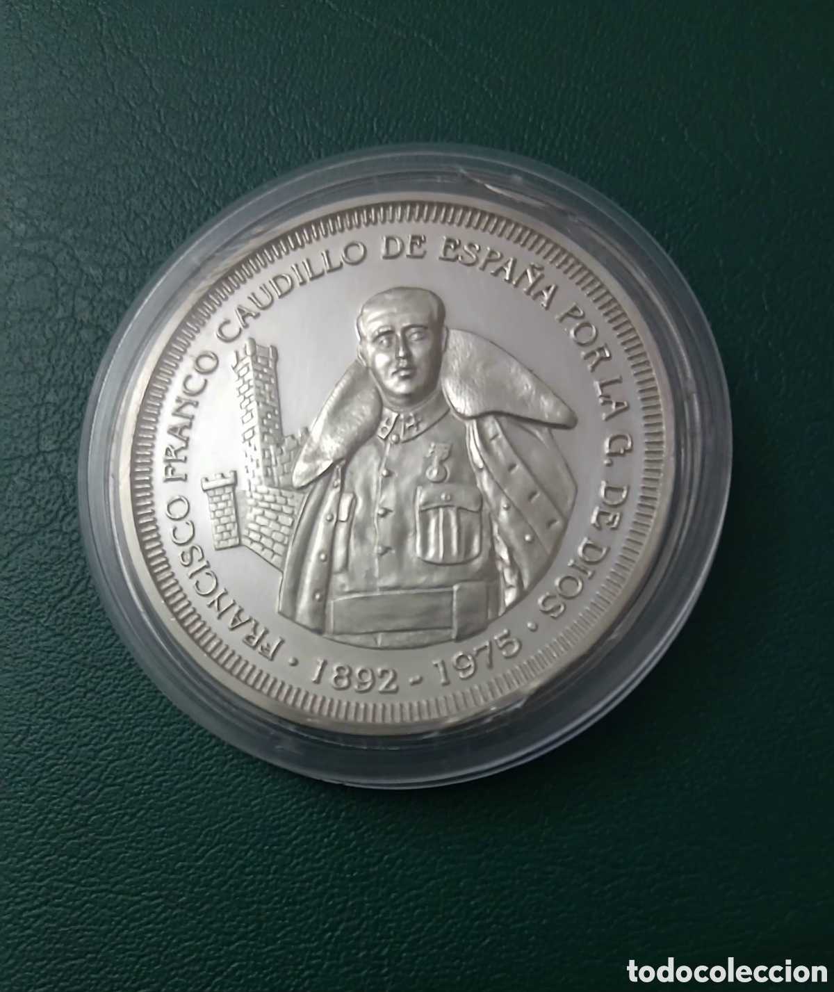 Monedas Franco: Onza plata pura de Francisco Franco con Capote y reverso Aguila de San Juan