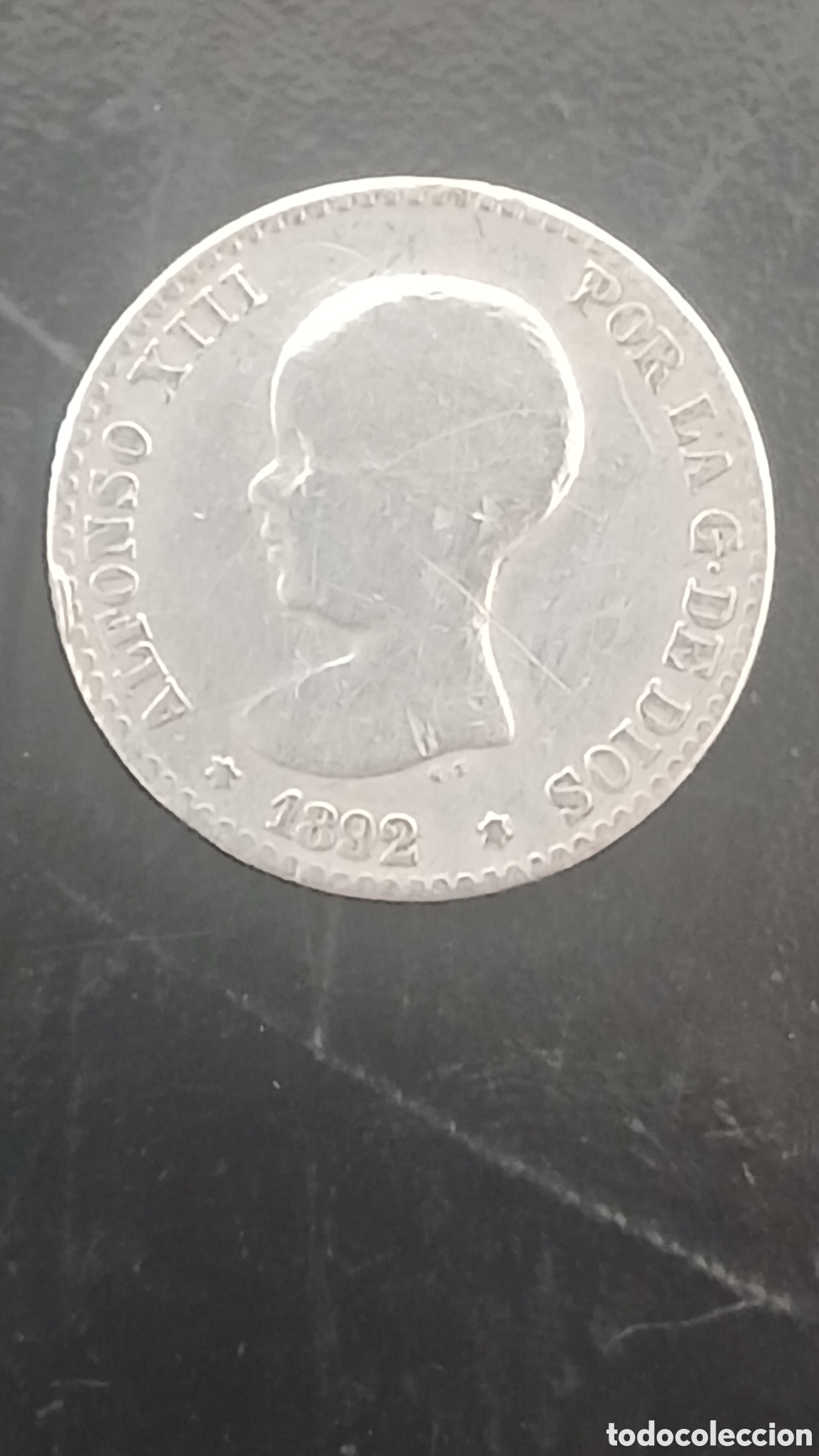 Monedas Franco: Moneda de 50 c&eacute;ntimos de Alfonso XIII, acu&ntilde;ada en 1892.