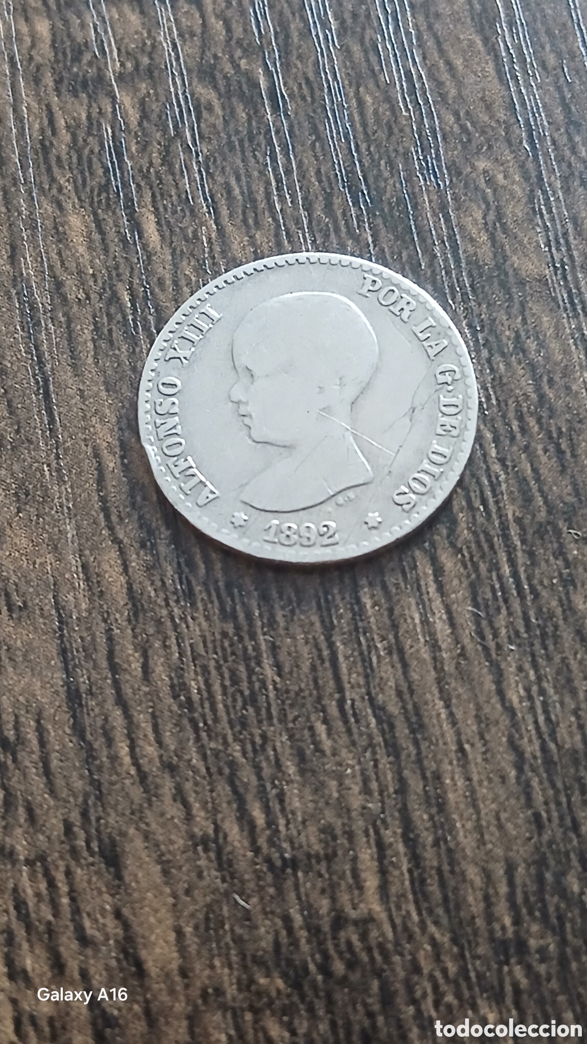 Monedas Franco: Moneda de 50 c&eacute;ntimos de Alfonso XIII, acu&ntilde;ada en 1892. - Anverso: Escudo de Espa&ntilde;a con corona.