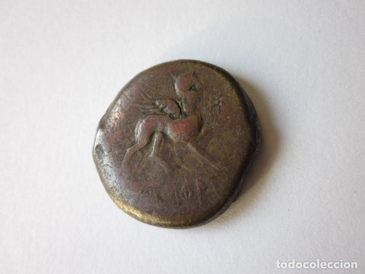 Monedas ib&eacute;ricas: As de Castulo. Esfinge y estrella. - Foto 1
