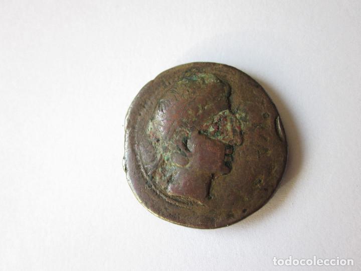 Monedas ib&eacute;ricas: As de Castulo. Esfinge y estrella. - Foto 2