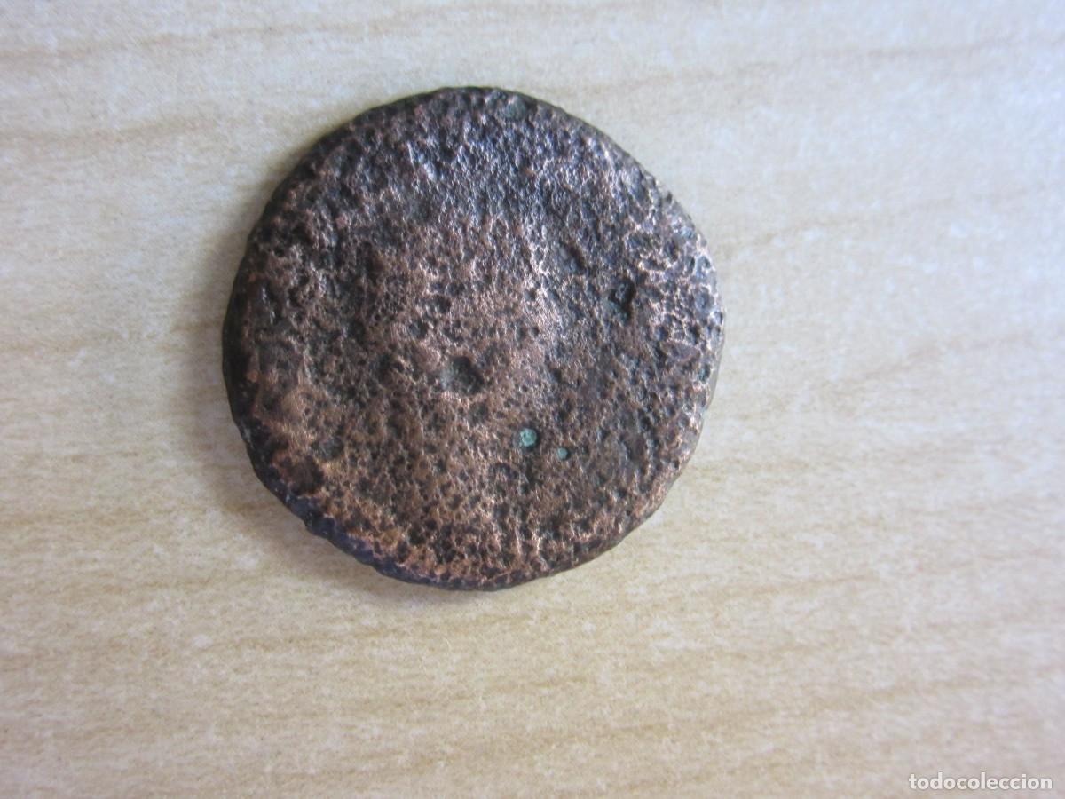 Iberische M&uuml;nzen: As de Em&eacute;rita Augusta S I Bronce Di&aacute;metro 2,5cm Peso 8,42 gr Reverso Puerta de la Ciudad