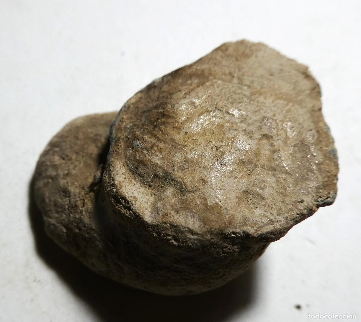 Monedas ib&eacute;ricas: Raro Plomo monetiforme, iberoromano SERIE DE LAS MINAS. Cabeza en anverso y letras en reverso