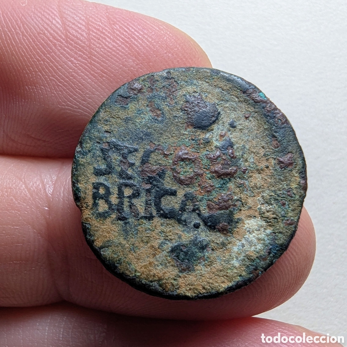 Monedas ib&eacute;ricas: Semis hispano-romano Segobriga 14-37 d.C. Tiberio