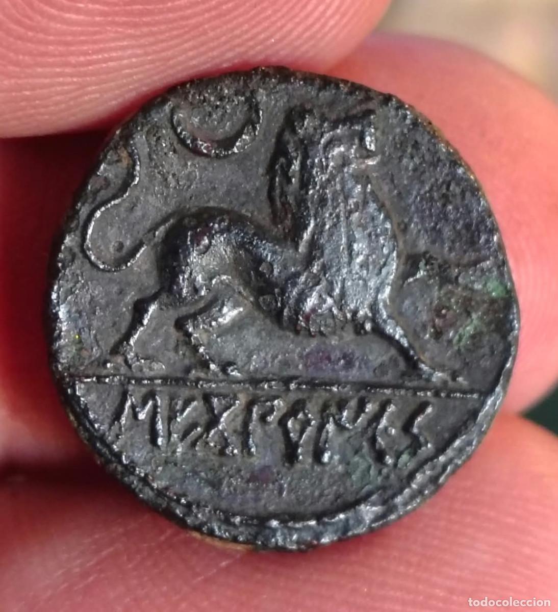 Monedas ib&eacute;ricas: XS- SEKOBIRIKES Semis o Cuadrante Cabeza con casco / leon RARO