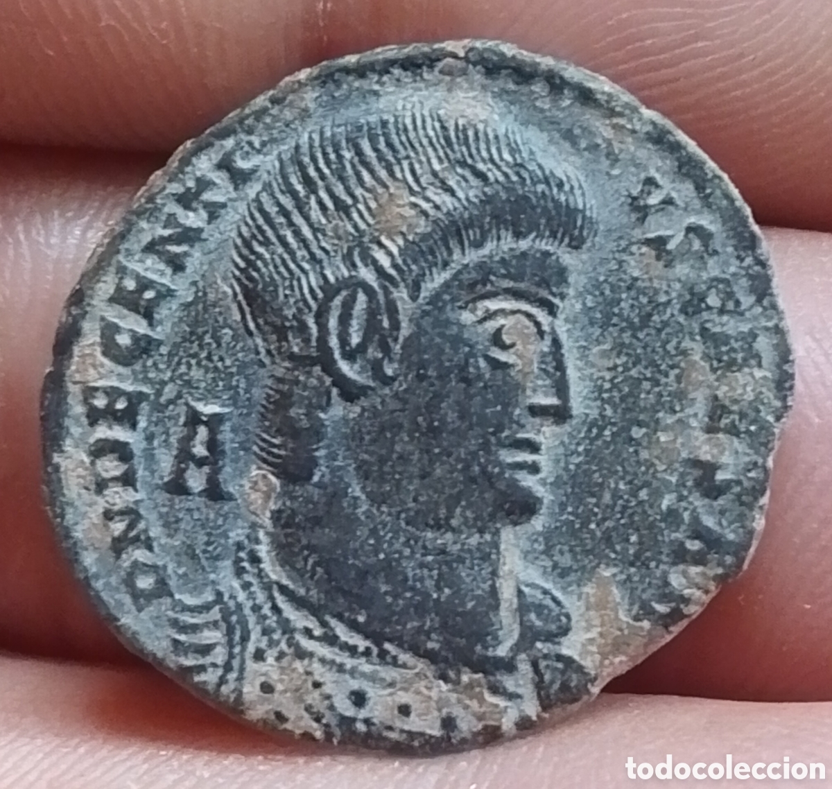 Monedas Imperio Romano: Decencio maiorina A (valor denario) VICTORIAE DD NN AVG ET CAE TRP Treveris