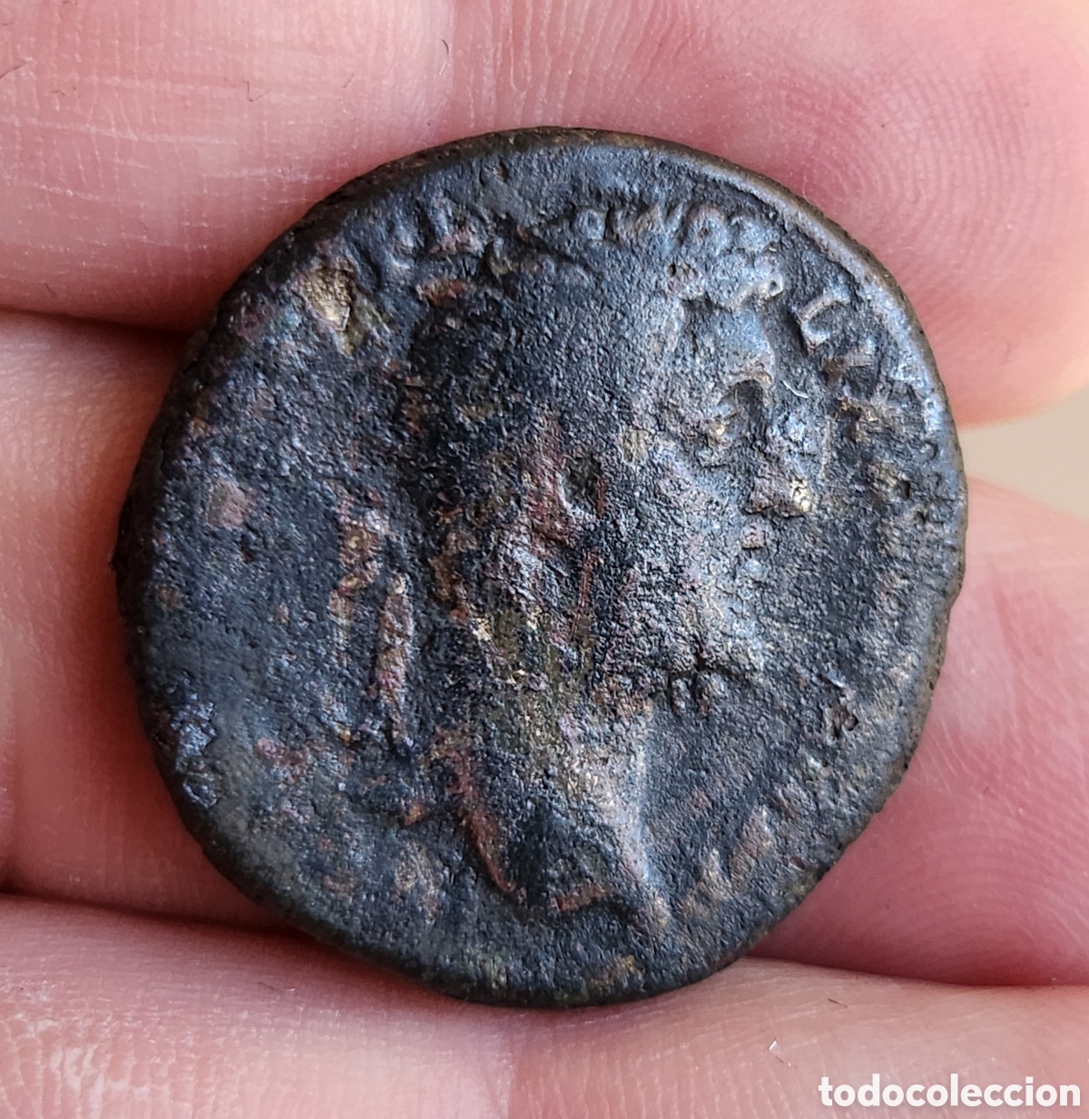 Monedas Imperio romano: Rarisimo Dupondio Comodo reverso espada con serpientes enfrentadas